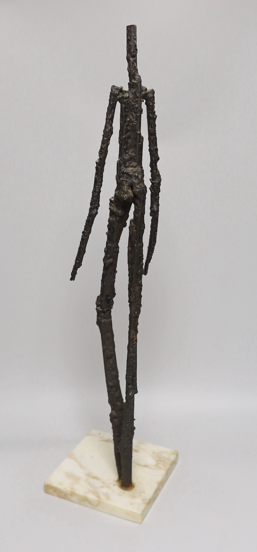 A 20th century abstract figural bronze, 63cms high